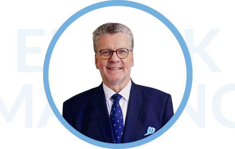 Profilbild von Dr. Erik Massing in einem weißen Kreis mit blauem Rahmen